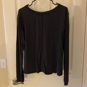 Lululemon long sleeve black heathered top with unique stitching.